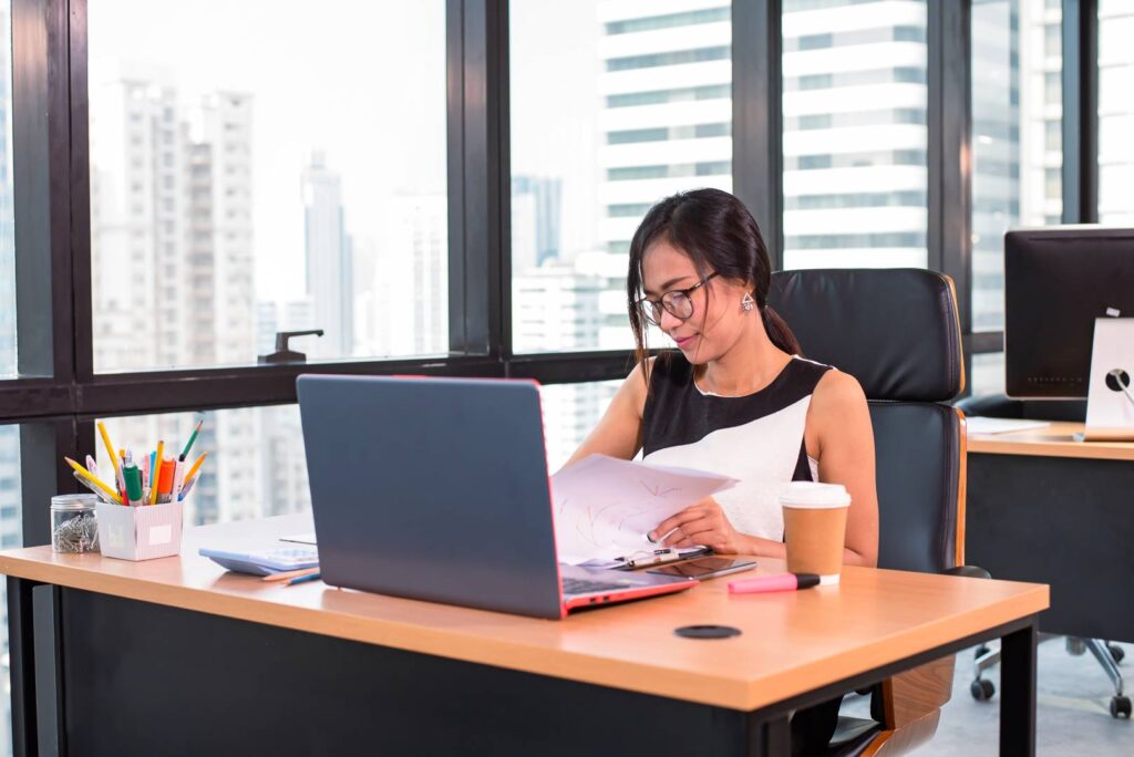 business woman check document in modern office 2022 11 17 08 58 06 utc BILLUP